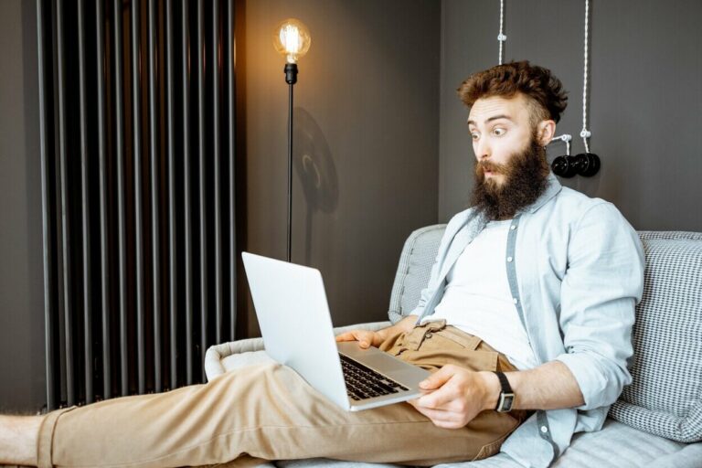Man working with laptop from home